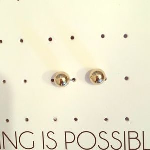 A pair of gold earrings